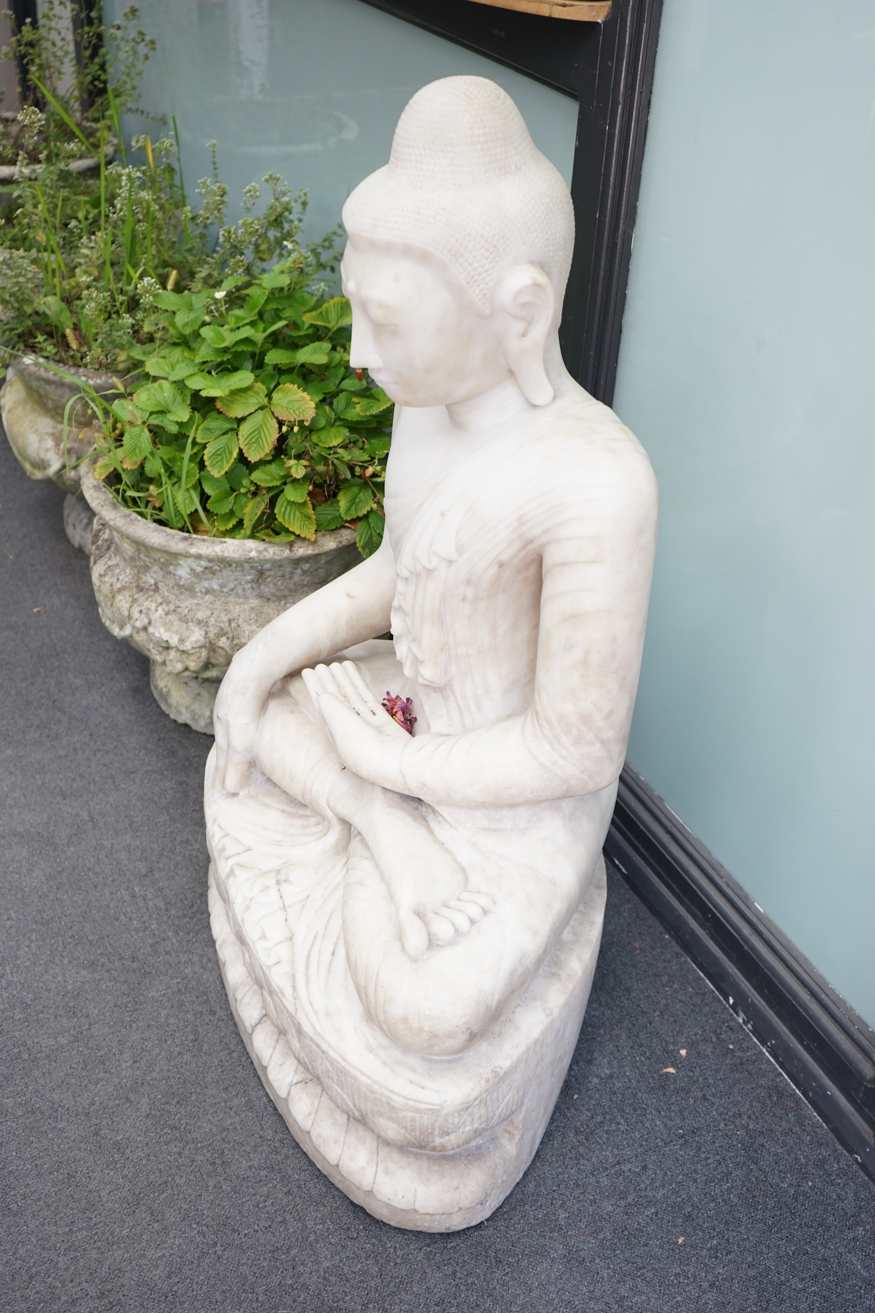 A massive Burmese marble seated figure of Buddha Shakyamuni, 18th/19th century